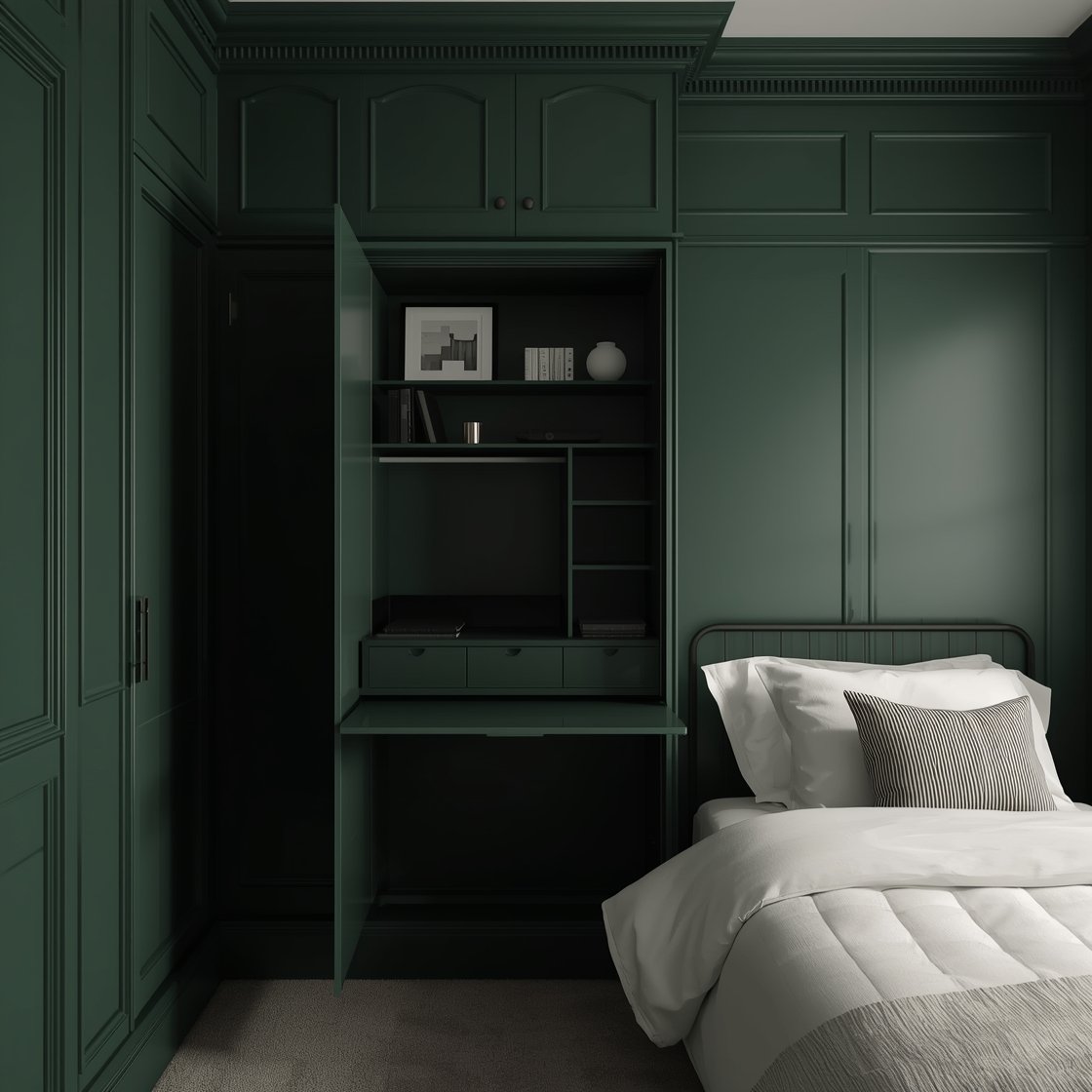 Medium straight-on photorealistic shot of a monochrome smart wall with Murphy-desk: room enveloped in a single deep hue (choose moody green) across walls, trim, and tall wardrobe with flat fronts and discreet finger pulls; a fold-down wall desk partially open showing a neat work surface, closing to reveal a clean sleep zone; inside cabinet glimpses of adjustable shelves and pull-out trays organized like a mini dressing station; simple slim black metal bed with crisp white bedding and a striped lumbar pillow; picture ledge above with black-and-white prints; controlled, moody lighting to enhance the saturated color field.